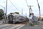 A Bay Head bound shuttle train is about to cross the Atlantic Avenue Grade Crossing in Point Pleasant Beach only a few blocks before departing PPB Station 